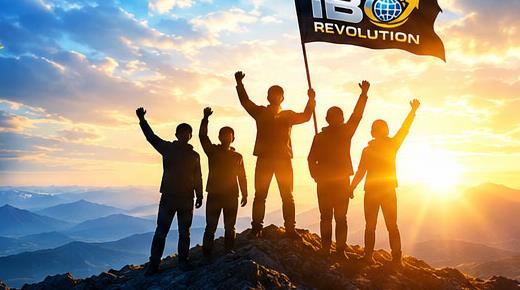 Five people on a mountain at sunrise, holding an IBO Revolution flag